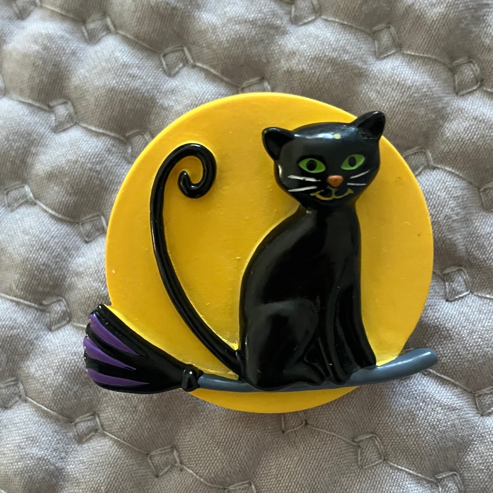 Elegant Black Cat Brooch with Yellow and Purple Details